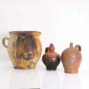 A group of terracotta and earthenware vessels,