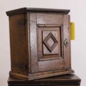 A small oak cabinet of drawers, probably 19th century and later adapted,