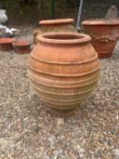 A terracotta planter, of modern manufacture,