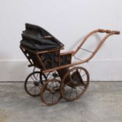 A Victorian wood four-wheel perambulator, 19th century,