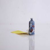 A Chinese underglaze blue and red porcelain snuff bottle,