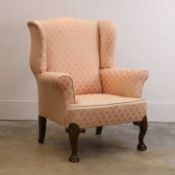 A George II-style walnut wing armchair, late 19th century,