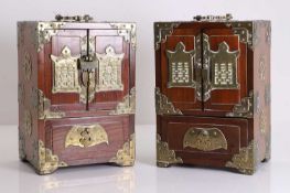 A pair of Chinese table top cabinets,