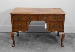 A George I style walnut writing table, early 20th century,