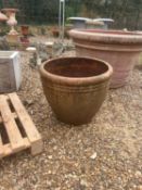 A terracotta planter, of modern manufacture,