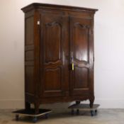 A French provincial walnut armoire, 19th century,