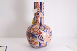 A large Japanese imari bottle vase, late 19th/ early 20th century,