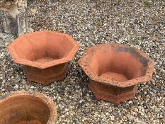 A pair of terracotta planters, of modern manufacture,