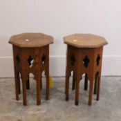 A pair of Moorish style oak occasional tables, 20th century, in the manner of Liberty,