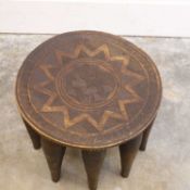 A carved hardwood Nupe stool, 20th century, Nigeria,