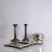 A collection of silver table items,