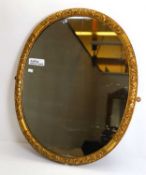 A George II style giltwood oval wall mirror, 19th century,