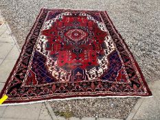 A Persian design rug, 20th century,