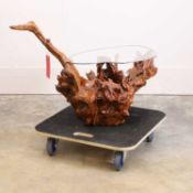 Lisa Culley (Contemporary) A small glass top root coffee table,