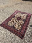 An ivory ground carpet 20th Century, Persian