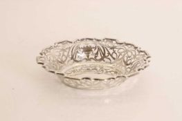 A pierced silver dish,