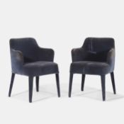 A pair of modern upholstered design chairs, of recent manufacture,