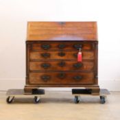 A George III mahogany bureau, circa 1780,
