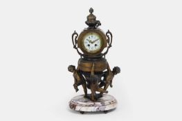 A gilt-metal and marble mantel clock in the Louis XVI taste, late 19th/early 20th century, French,