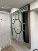 A large square silvered wall mirror by OKA of recent manufacture