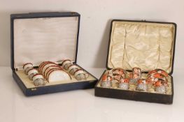 Two cased silver mounted coffee services,