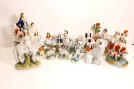 A large collection of Staffordshire pottery figures, 19th century and later,
