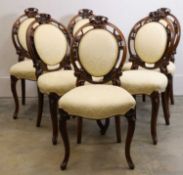 A set of six Victorian walnut dining chairs, circa 1870,