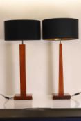 A pair of large hardwood desk lamps and shades, of recent manufacture,