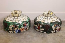 A pair of stained glass style lamp shades, by Christopher Wray,