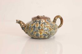 A Staffordshire pottery agate ware teapot, 18th century and later,