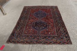 A Shiraz wool rug, 20th century,