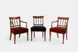 A set of twelve George III mahogany dining chairs, circa 1800,