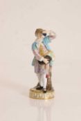 A Meissen porcelain figure of a grape seller, 19th century,