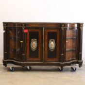 An ebonised Victorian credenza, 19th century,