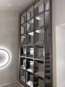 A large silvered rectangular wall mirror by OKA, of recent manufacture,