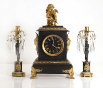A black marble and gilt metal mantel clock, 19th century,