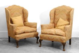 A pair of Queen Anne style wing armchairs, early 20th century,