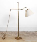 A brass framed adjustable reading lamp, of recent manufacture,