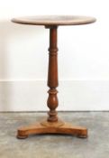 A pollard-oak centred wine table,
