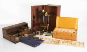A boxed R & J Beck London microscope,