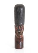 A trench art figural carving,
