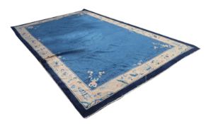 A Chinese wool rug, early 20th century,