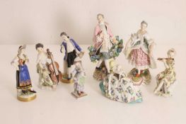 A pair of Continental porcelain figures, 20th century,