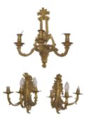 A composed set Louis XV-style gilt-metal wall appliques or sconces, late 19th / early 20th century,