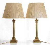 A pair of brass Corinthian columns table lamps, 20th century,