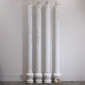 A set of four wooden twisted columns, early 20th century,