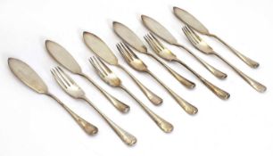 A group of rat tail Silver fish knives and forks,