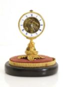 A French gilt table clock,