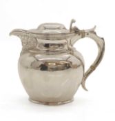 A silver lidded masked jug, circa.1900
