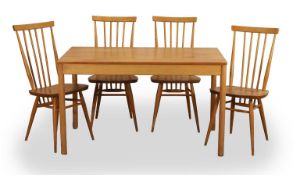 An Ercol blonde elm dining suite, 20th century,